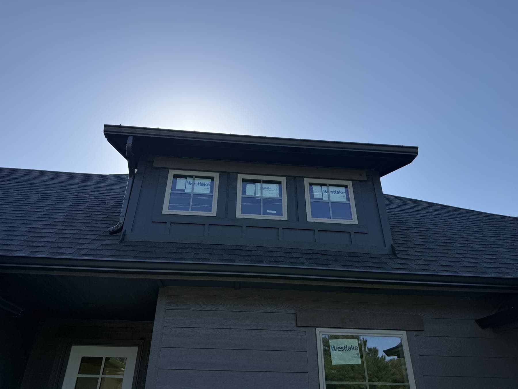 New seamless gutters and downspout on a new-construction home in Edmond, OK