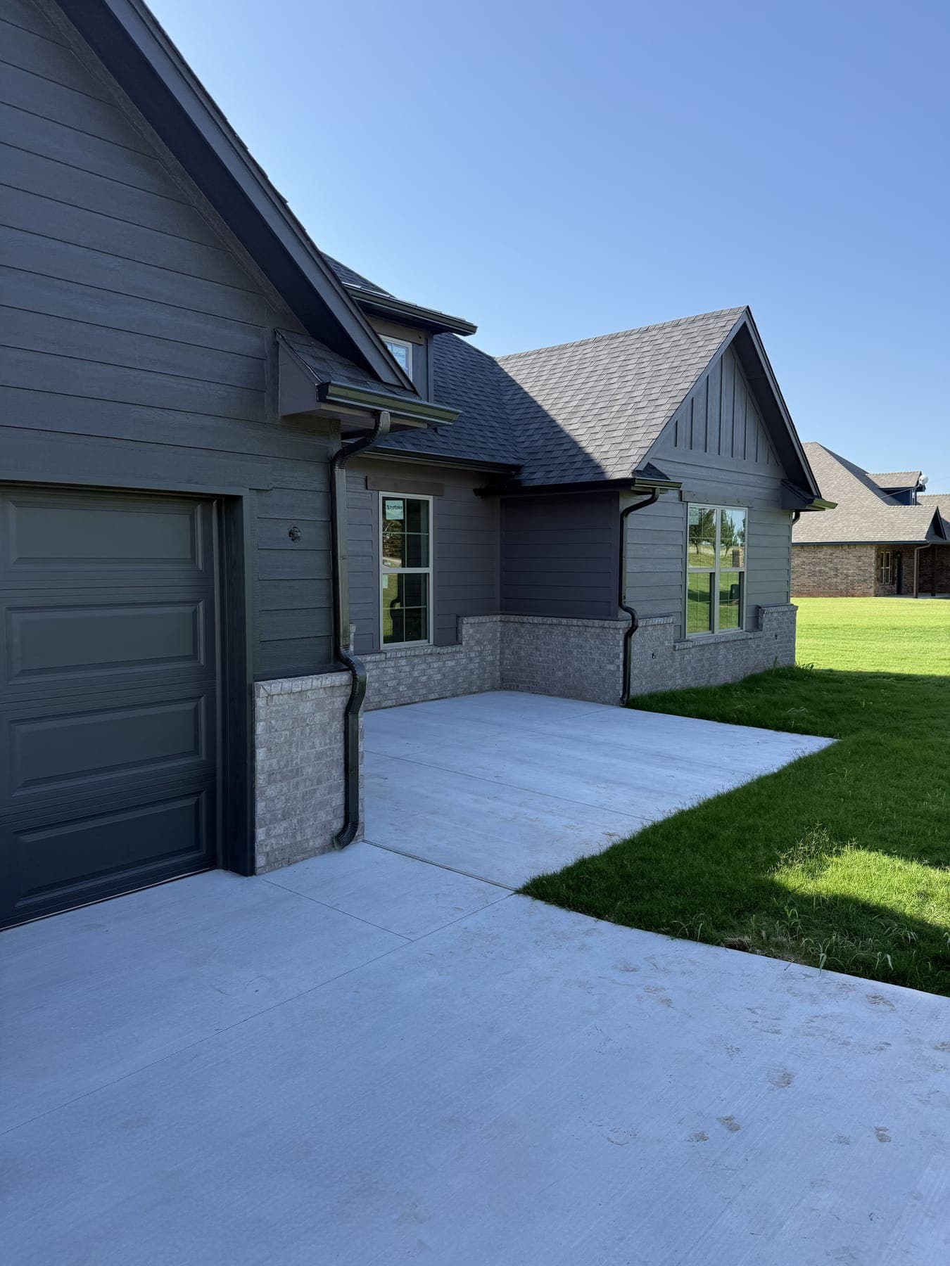 New seamless gutters and downspout on a home in central Oklahoma